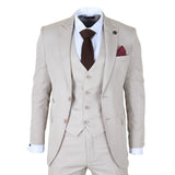 Beige suit with a brown tie and pocket square on a white background