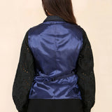 Costum albastru pentru femei, cu vestă în carouri tweed